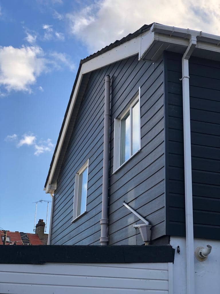 Picture of house with cladding. Southend & Essex Roofing.